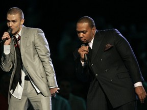 Justin Timberlake, left, and Timbaland perform during the opening of the 2006 MTV Video Music Awards in New York, on Thursday, Aug. 31, 2006.