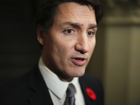 Justin Trudeau talks to reporters