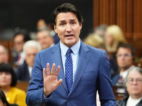 Justin Trudeau with his palm facing front