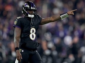 Lamar Jackson of the Baltimore Ravens celebrates a first down against the Cincinnati Bengals during the fourth quarter of the game at M&T Bank Stadium on Nov. 16, 2023 in Baltimore, Md.