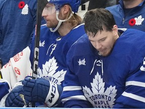 Maple Leafs goaltender Ilya Samsonov reacts on the bench after being pulled from the game after conceding four goals against Tampa Bay Lightning in Toronto on Monday, Nov. 6, 2023.