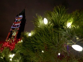 A tree is adorned with Christmas lights on Parliament Hill in Ottawa, Dec 7, 2016.