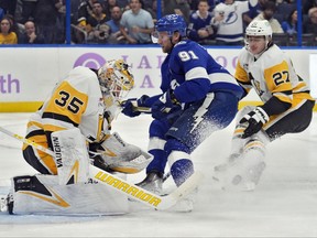 Pittsburgh Penguins goaltender Tristan Jarry stops a shot.