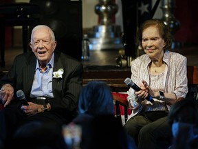 Former President Jimmy Carter and his wife former first lady Rosalynn Carter sit together during a reception to celebrate their 75th wedding anniversary Saturday, July 10, 2021, in Plains, Ga.