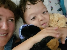 Marshall Ku is shown with his mom, Bridget, in this supplied photo.