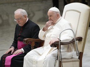 Pope Francis attends the weekly general audience at the Vatican, Wednesday, Nov. 29, 2023.