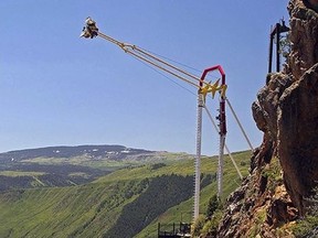 People ride the Giant Canyon Swing