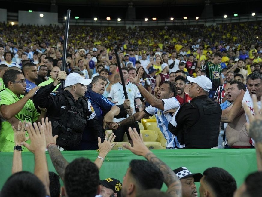 Police try to stop a fight