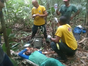 Rescuers administer first aid