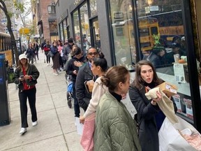 Line outside NYC coffee shop Caffe Arrone