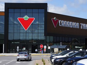 Shoppers come and go from a Canadian Tire store