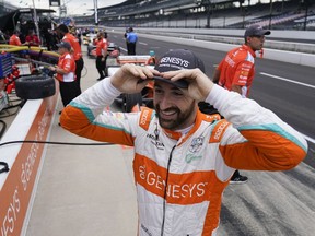 James Hinchcliffe, of Canada, waits in the pits before a practice session for the IndyCar auto race at Indianapolis Motor Speedway, Friday, Aug. 13, 2021, in Indianapolis.&ampnbsp;Hinchcliffe, a six-time winner on the IndyCar circuit, headlines he Canadian Motorsports Hall of Fame's Class of 2023.&ampnbsp;THE CANADIAN PRESS/AP-Darron Cummings