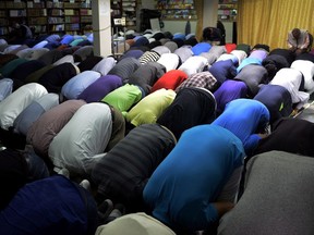 People attend prayers at the Toronto Islamic Centre on Friday, Sept. 25, 2015.
