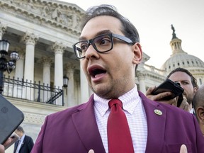 FILE - Rep. George Santos, R-N.Y., speaks to reporters outside the Capitol, in Washington, May 17, 2023. The House Ethics panel says it has found "substantial evidence" of lawbreaking by Republican Rep. George Santos of New York and has referred its findings to the Justice Department.