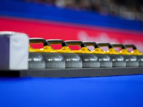 Curling stones are seen on the ice at the Scotties Tournament of Hearts, in Kamloops, B.C., on Friday, February 24, 2023.Team Saskatchewan beat their Prairie rivals to win the 2023 Canadian Mixed Curling Championship on Saturday.THE CANADIAN PRESS/Darryl Dyck