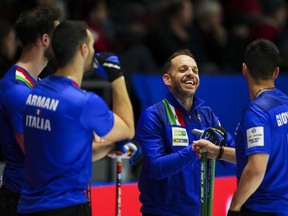 Italy's Joel Retornaz defeated Sweden's Niklas Edin 6-5 on Sunday to win the Grand Slam of Curling's Kioti National.&ampnbsp;Retornaz has a laugh with his team as they play Japan at the Men's World Curling Championship in Ottawa on Friday, April 7, 2023.