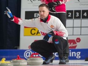 Team Canada skip Brad Gushue signals during draw four action against Japan at the Pan Continental Curling Championship in Kelowna, B.C. on Tuesday, Oct.31, 2023. Gushue says he doesn't blame TSN for dropping television coverage of the Pan Continental Curling Championships.THE CANADIAN PRESS/HO-Michael Burns **MANDATORY CREDIT**