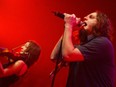 Les Cowboys Fringants' Karl Tremblay sings at the Bell Centre in 2003. He died this week of prostate cancer.