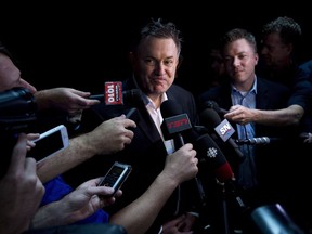 Tim Leiweke speaks to the media after participating in the ALS Ice Bucket Challenge in Toronto on Wednesday, Aug. 20, 2014. Leiweke promises to bring back a hockey team to Hamilton in a couple of years to a revamped FirstOntario Centre, just not an NHL franchise.