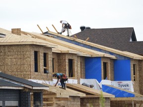 New homes are constructed in Ottawa on Monday, Aug. 14, 2023.