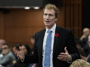 Immigration, Refugees and Citizenship Minister Marc Miller rises during Question Period, in Ottawa, Tuesday, Oct. 31, 2023.