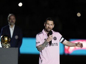 Inter Miami forward Lionel Messi speaks during a ceremony honoring his Ballon d'Or trophy, before the team's club friendly soccer match against New York City FC, Friday, Nov. 10, 2023, in Fort Lauderdale, Fla.
