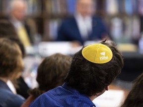 Samuel Winkler wears a Hillel kippah during a visit by Education Secretary Miguel Cardona to Towson University to discuss anti-Semitism on college campuses, Nov. 2, 2023, in Towson, Md.