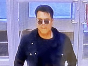 This unidentified man is suspected of robbing a Burlington jewelry store on Oct. 12, 2023.
