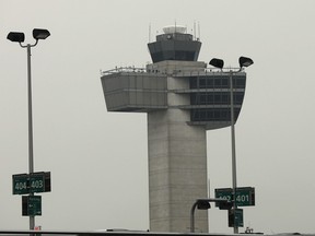 An air traffic control tower stands at John F. Kennedy International Airport (JFK) on June 5, 2017 in New York City.