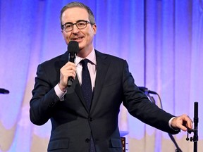 John Oliver performs onstage at 2023 A Funny Thing Happened On The Way To Cure Parkinson's at Casa Cipriani on Nov. 11, 2023 in New York City.