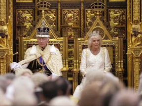 King Charles III sits besides Queen Camilla during the State Opening of Parliament at the Houses of Parliament on Nov. 7, 2023 in London.