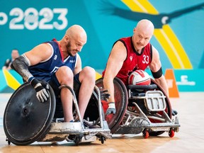 Canada's Zak Madell, right, battles United States' Eric Newby during gold medal game wheelchair rugby action at the 2023 Parapan American Games in Santiago, Chile in this Thursday, Nov. 23, 2023 handout photo.