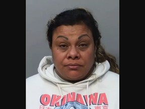 Mugshot of Sandra Jimenez, who stabbed her boyfriend in eye with needle for "looking at other women."