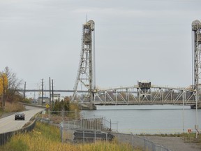A lift bridge spans the Welland Canal on Glendale Ave. in St. Catharines, Ont., Thursday, Oct. 26, 2023. St. Lawrence Seaway workers have ratified a new, three-year collective agreement.