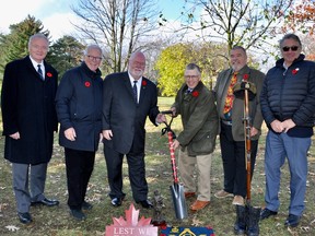 Col. Geordie Elms with Adam Saunders, Alex Zimmerman, Brian Patterson, Ontario LPF President Mike Voith and Carmine Infante in the Meadowvale Cemetery “turn the sod for a Cross of Honour that will be placed in the Ontario Field of Honour during 2024.” -- Supplied photo