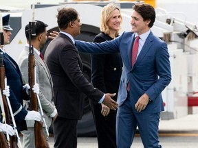 Canadian Prime Minister Justin Trudeau is greeted upon arrival at San Francisco International Airport in San Francisco, California, on November 15, 2023, to attend the Asia-Pacific Economic Cooperation (APEC) Leaders' Week. The APEC Summit takes place through November 17. (Photo by Jason Henry / AFP) (Photo by JASON HENRY/AFP via Getty Images)