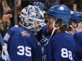 Maple Leafs goaltender Ilya Samsonov and William Nylander celebrate their 5-2 victory over the Vancouver Canucks at Scotiabank Arena on Nov. 11, 2023 in Toronto.