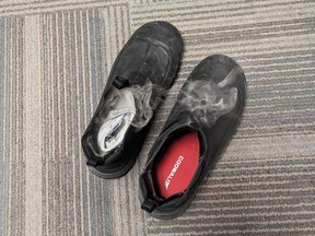 Boots smoking after battery heated insole in one caught fire.