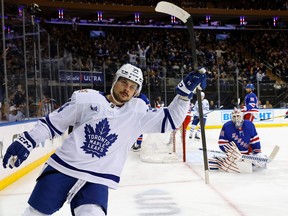 Auston Matthews of the Toronto Maple Leafs scores against Igor Shesterkin of the New York Rangers.