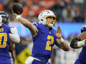 Los Angeles Chargers quarterback Easton Stick passes during the second half of an NFL football game against the Denver Broncos.