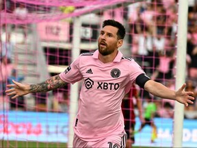 Inter Miami's Lionel Messi (C) celebrates after scoring the team's first goal during the Leagues Cup football match between against Atlanta United FC.