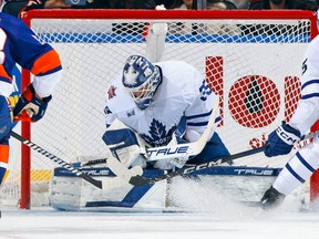 Ilya Samsonov of the Toronto Maple Leafs makes a save against the New York Islanders.