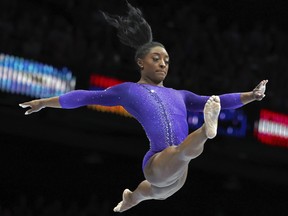 United States' Simone Biles competes on the beam during the apparatus finals at the Artistic Gymnastics World Championships.