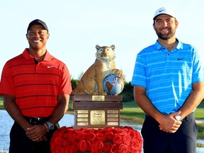 Scottie Scheffler of the United States and tournament host Tiger Woods