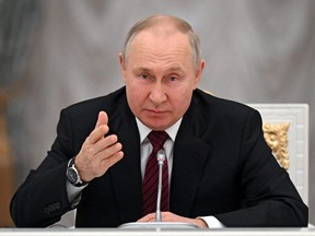 Russian President Vladimir Putin chairs a meeting with secretaries of foreign security councils on Afghan issues at the Kremlin in Moscow on February 8, 2023.
