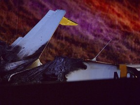 Emergency responders work the scene of a a small plane that crashed on Interstate 26 West, late Thursday, Dec. 14, 2023 near Asheville, N.C.