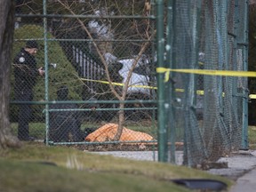 Toronto Police at the scene of a stabbing death of a man on Lockwood Rd. just north of Queen St. E. on Tuesday, December 12, 2023.