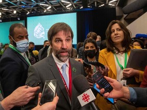 Canada's Minister of the Environment Steven Guilbeault speaks to journalists after a plenary meeting during the United Nations Biodiversity Conference (COP15) in Montreal, Quebec, on Dec. 19, 2022.