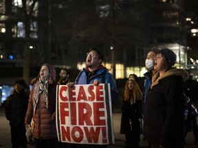 Protesters in support of Palestine gather outside a fundraising event held for Prime Minister Justin Trudeau in Vancouver on Thursday, December 14, 2023.