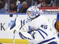 Maple Leafs goaltender Ilya Samsonov makes a blocker save against the Buffalo Sabres, Thursday, Dec. 21, 2023, in Buffalo, N.Y.